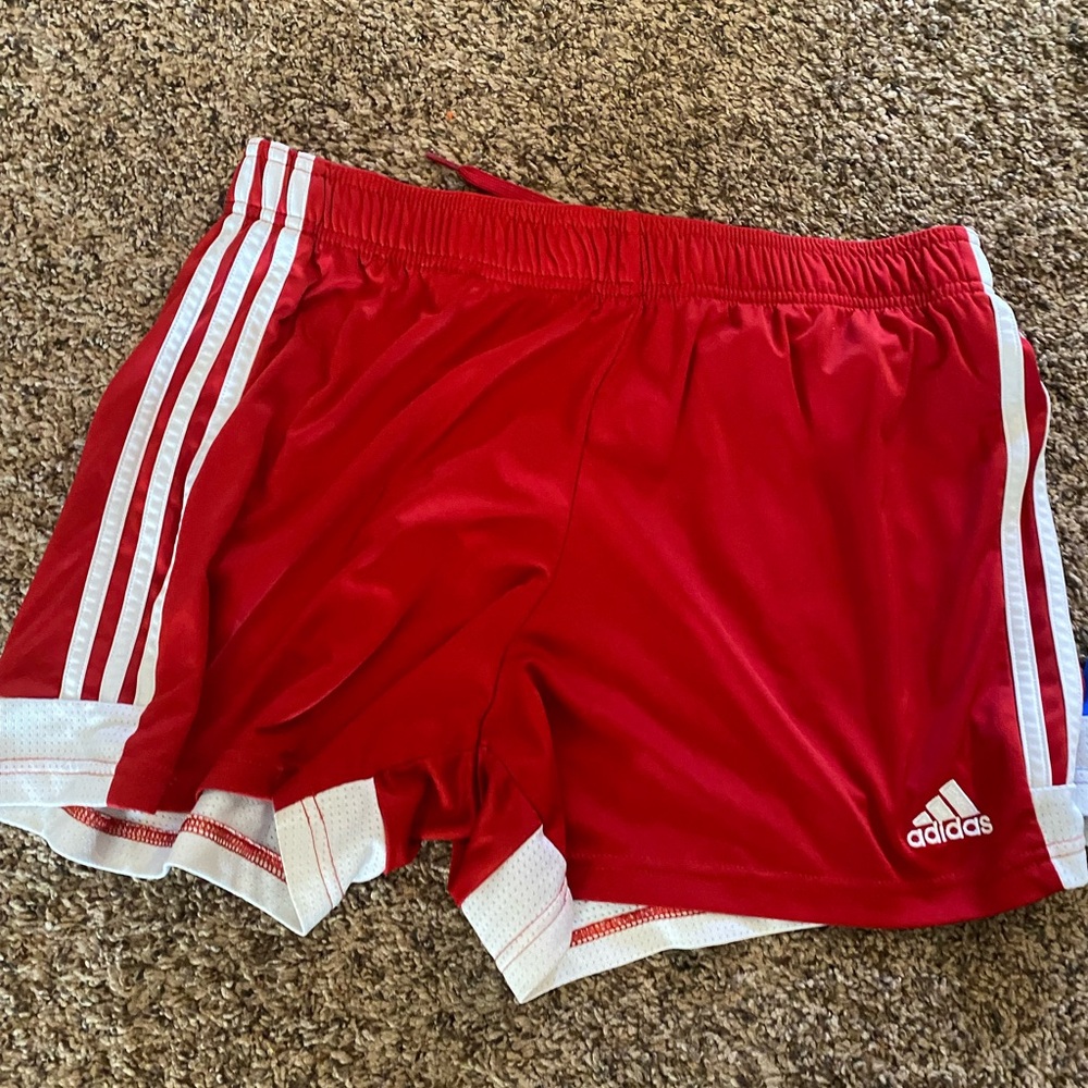Red adidas running shorts. Women’s size large
